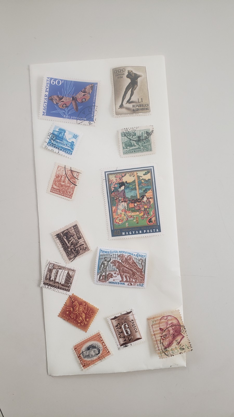 misclineous stamps from different regions of the world and 22kt gold replicas