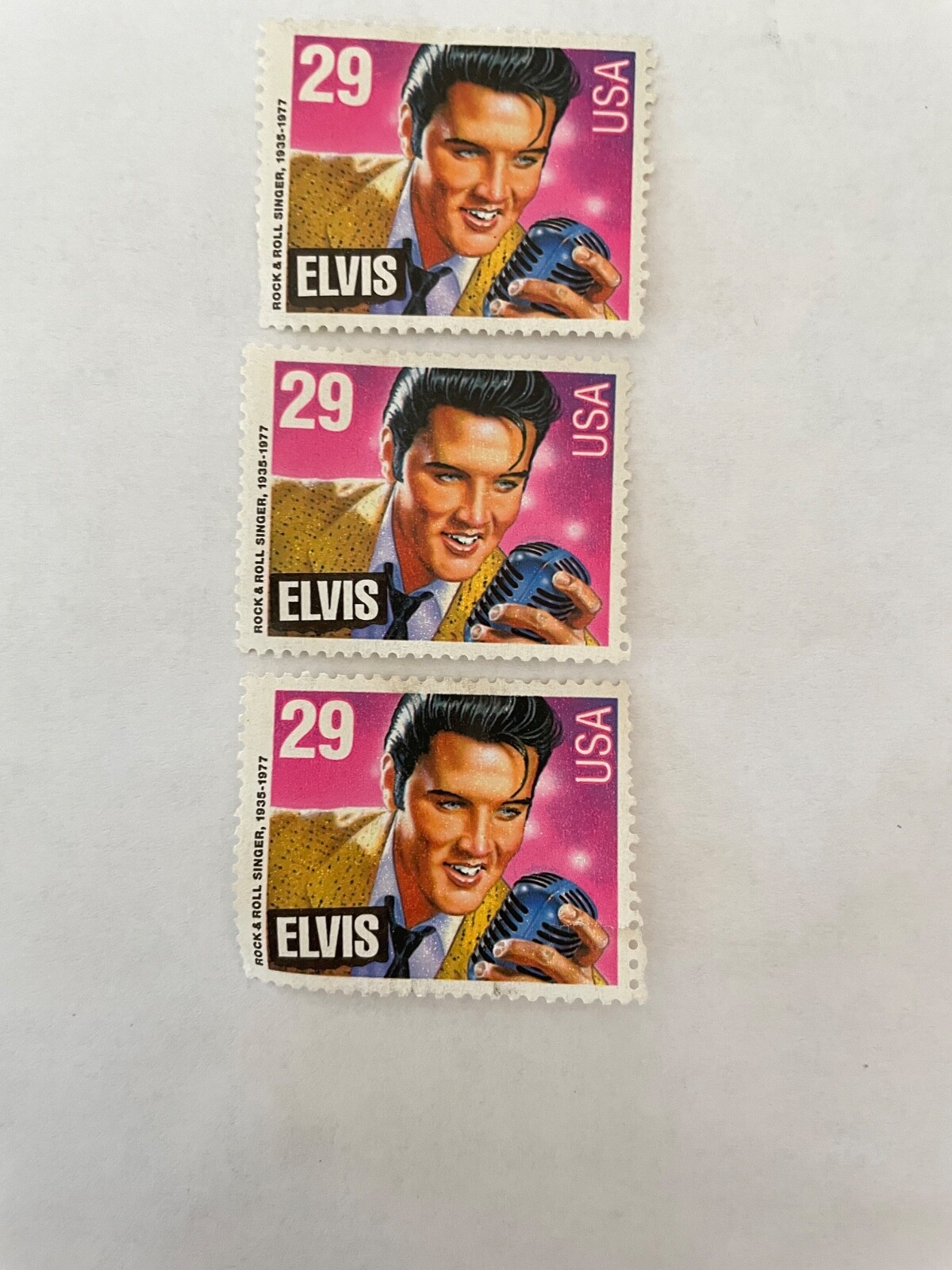 Elvis Presley stamp USA unused untouched pink and purple Elvis holding microphon