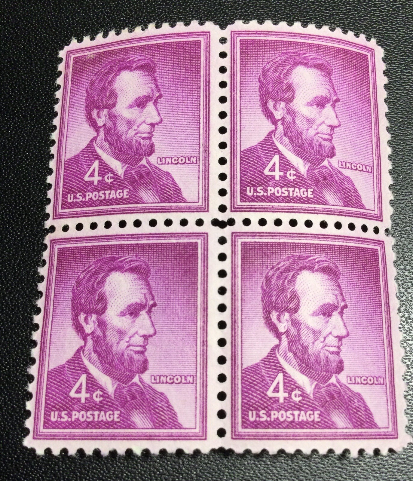 4 Of The Purple 4cent Lincoln Stamps