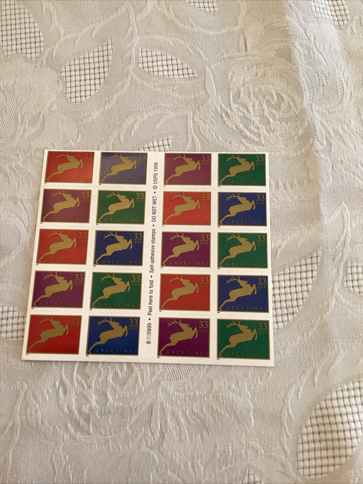 33 cent 1998 Holiday Greetings Reindeer stamps sheet of 20 self adhesive USPS