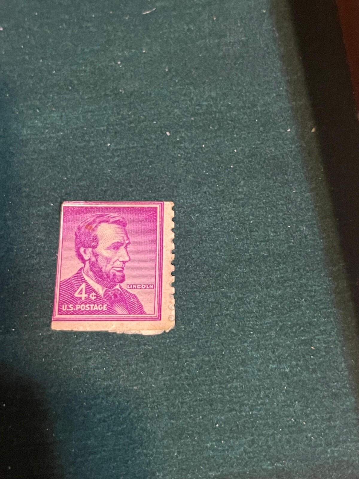 The original, Rare, 1941. four cent Abraham Lincoln stamp.