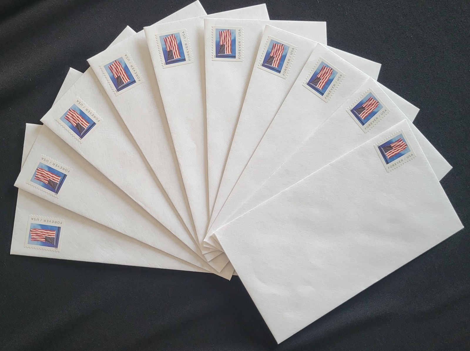 Lot of 10 Stamped Envelopes #6¾ (3⅝ x 6½) White Tinted Gummed Forever Flag #5342