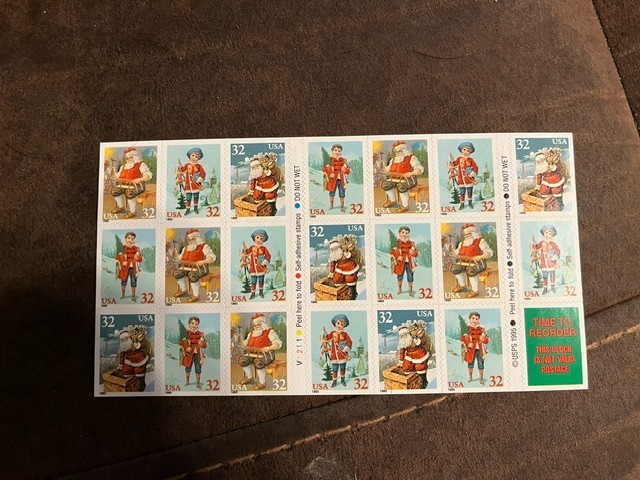 Scott #3008-11. 32c Holiday Greetings Christmas booklet of 20. 1995. MNH.