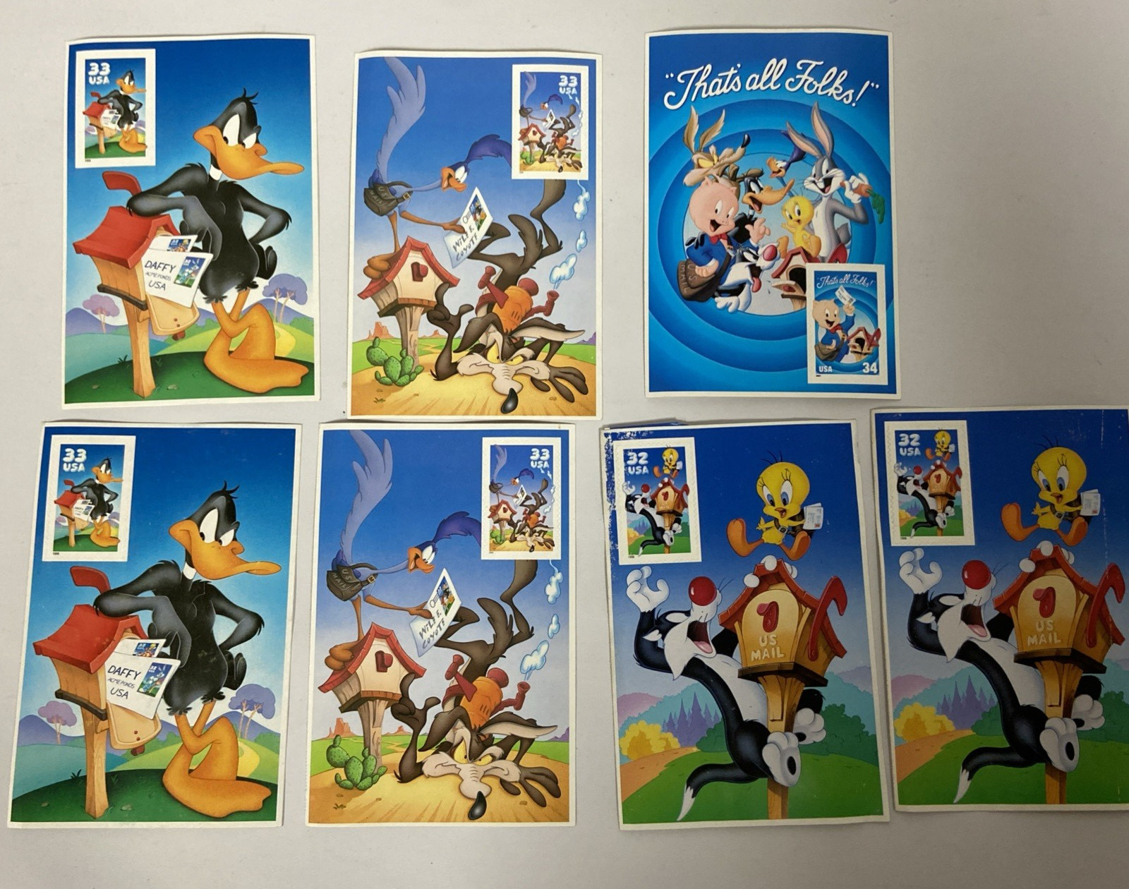 Postage lot of 4 Different Looney Tunes stamps. 7 total stamps