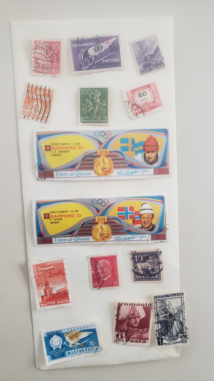 misclineous stamps from different regions of the world and 22kt gold replicas