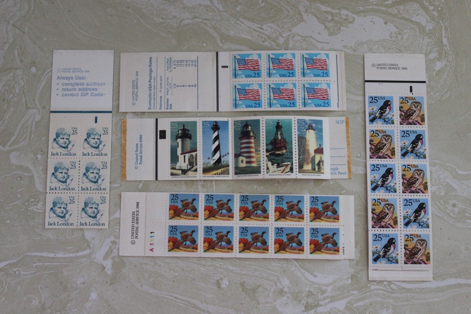 LOT OF ( 9 ) 25 CENT STAMPS BOOKLETS $37.50 FACE VALUE
