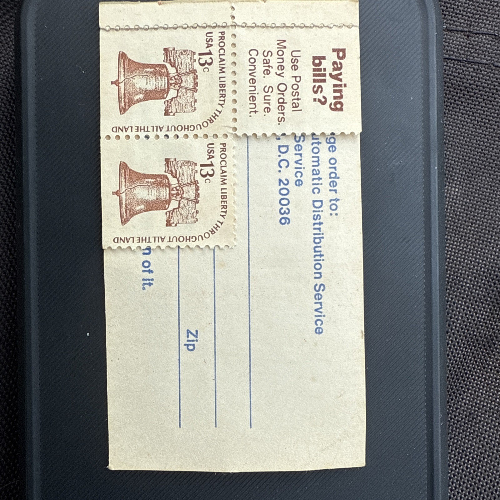The image shows a 13-cent Liberty Bell stamp issued in 1975.