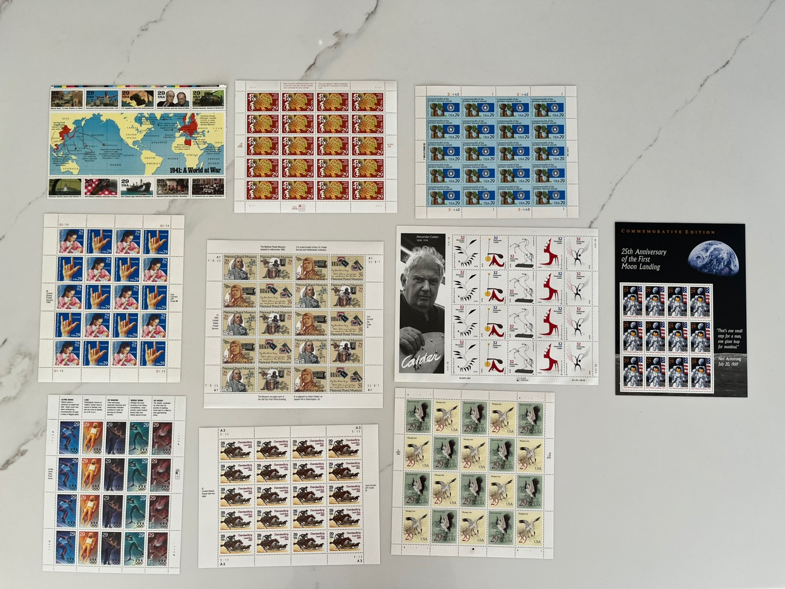 Lot Of 10 Sheets Of USPS Postage Stamps – Mint And Never Hinged. (DL-04)