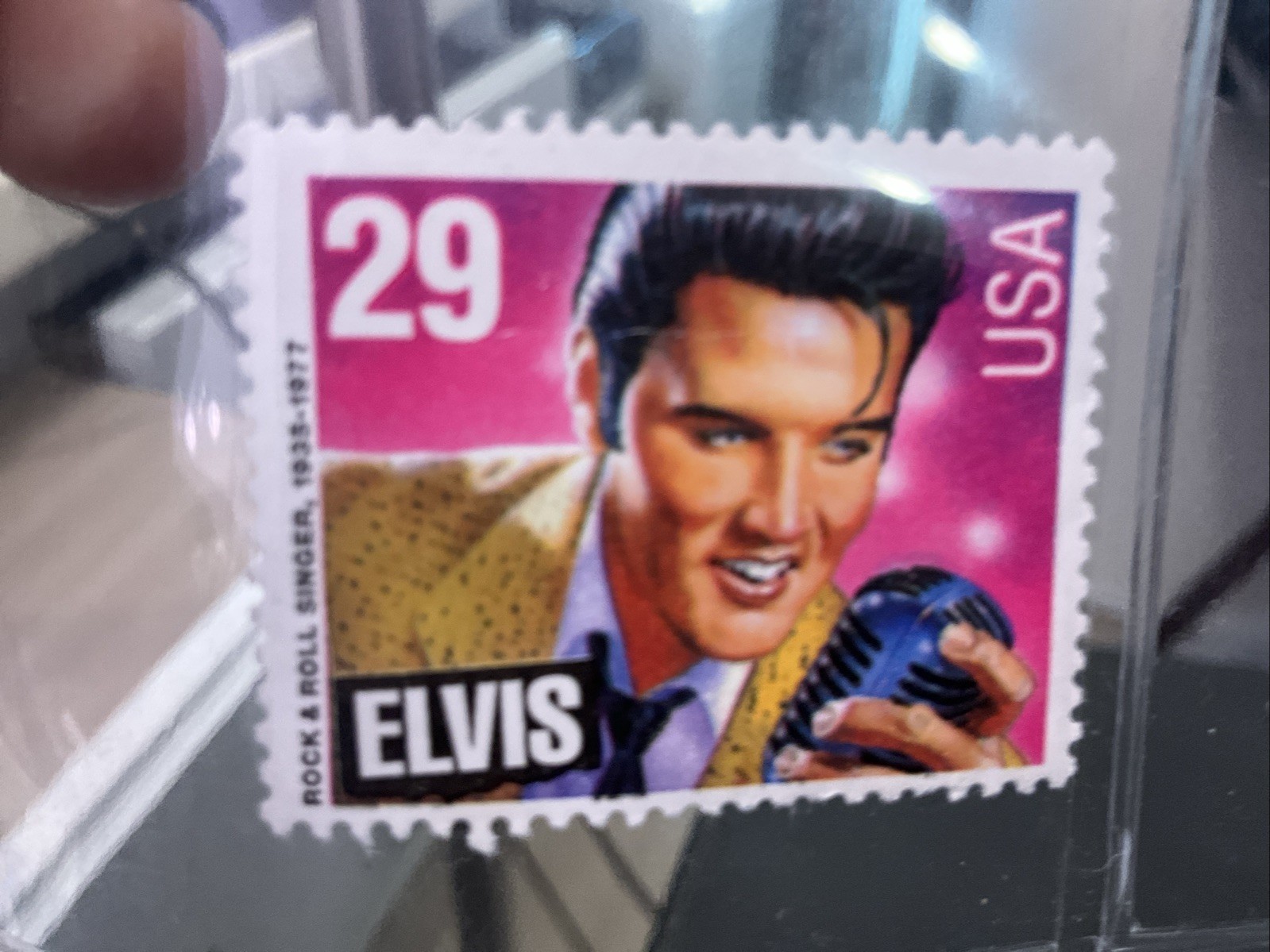 Elvis Presley stamp USA unused untouched pink and purple Elvis holding microphon