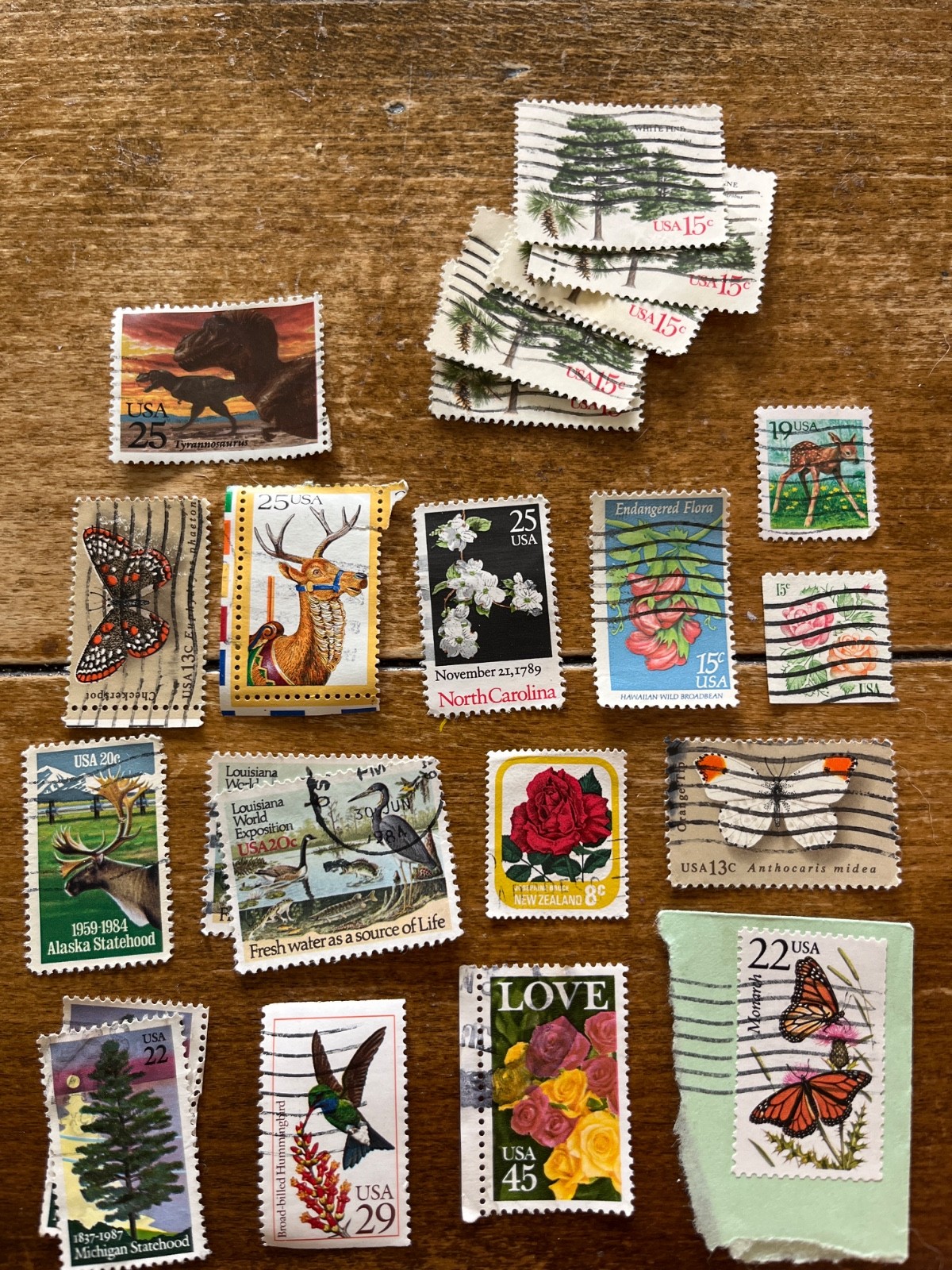Nature stamps: 22 animal, plant, and dinosaur stamps from the mid 1900s