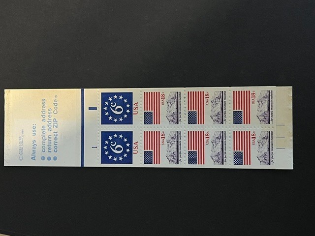 Scott BK138. 1981. For Purple Majesty booklet. 4 18c flag & 2 6c stars. MNH.