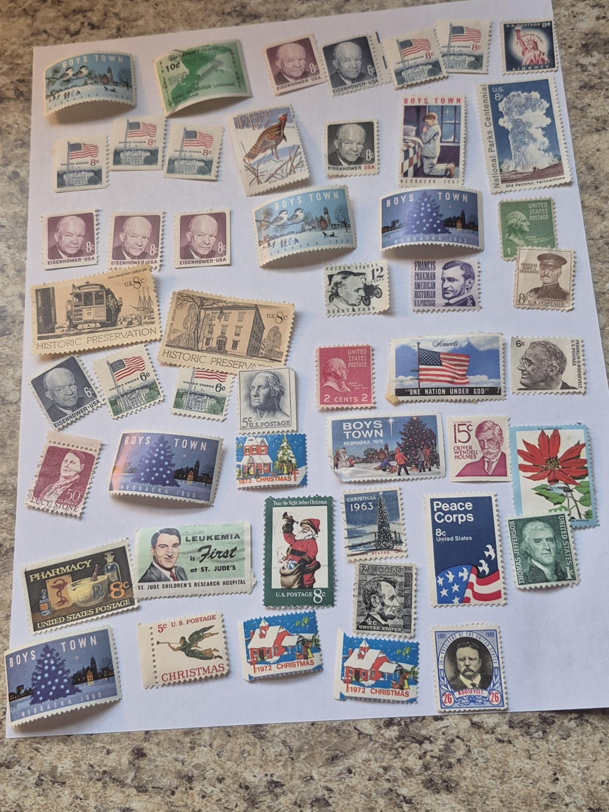 50 Mint condition US postage stamps. Various denominations 1940s,1950s,1960s