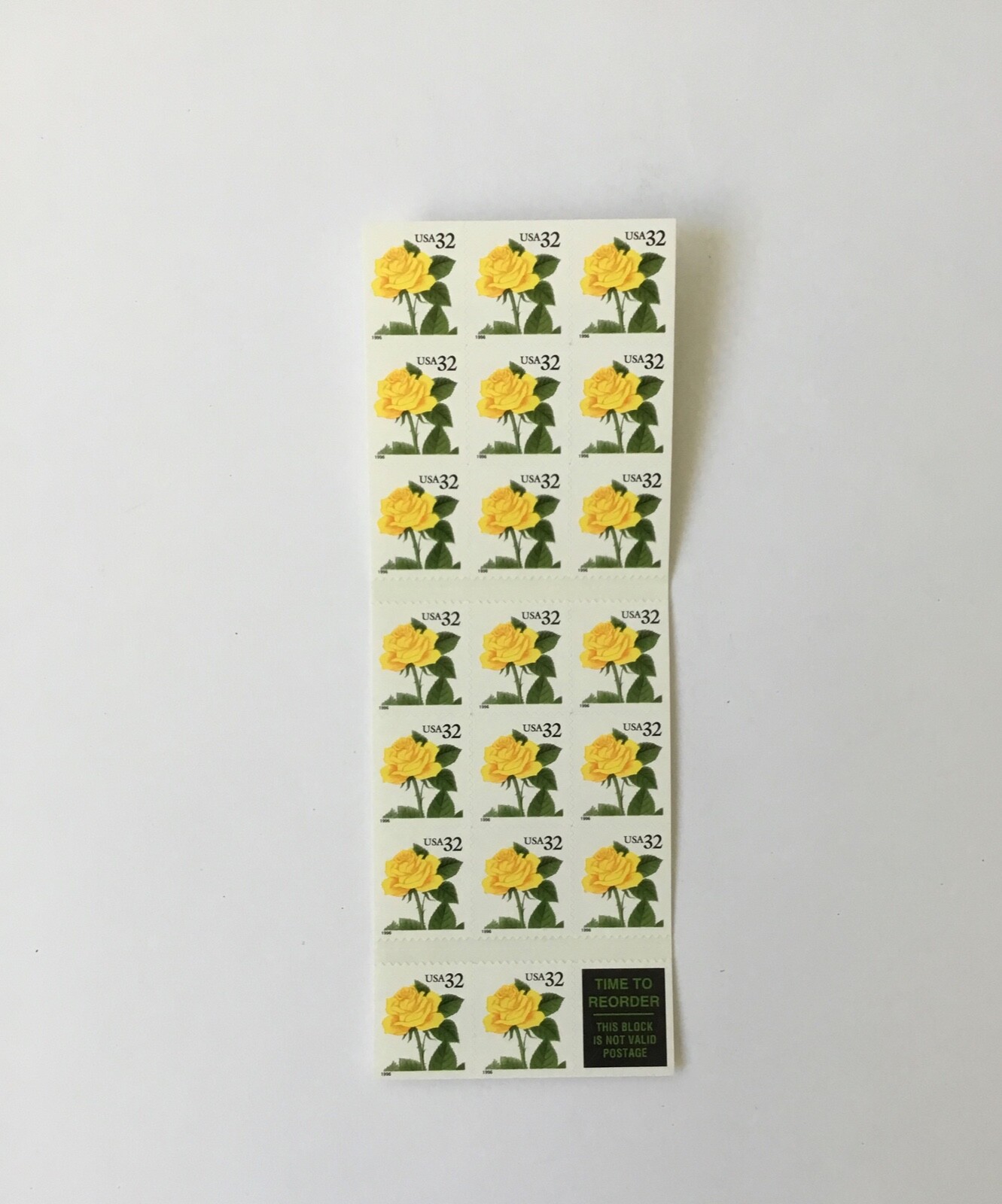 book of twenty 1996 32 cent US yellow rose self adhesive stamps Scott 3049