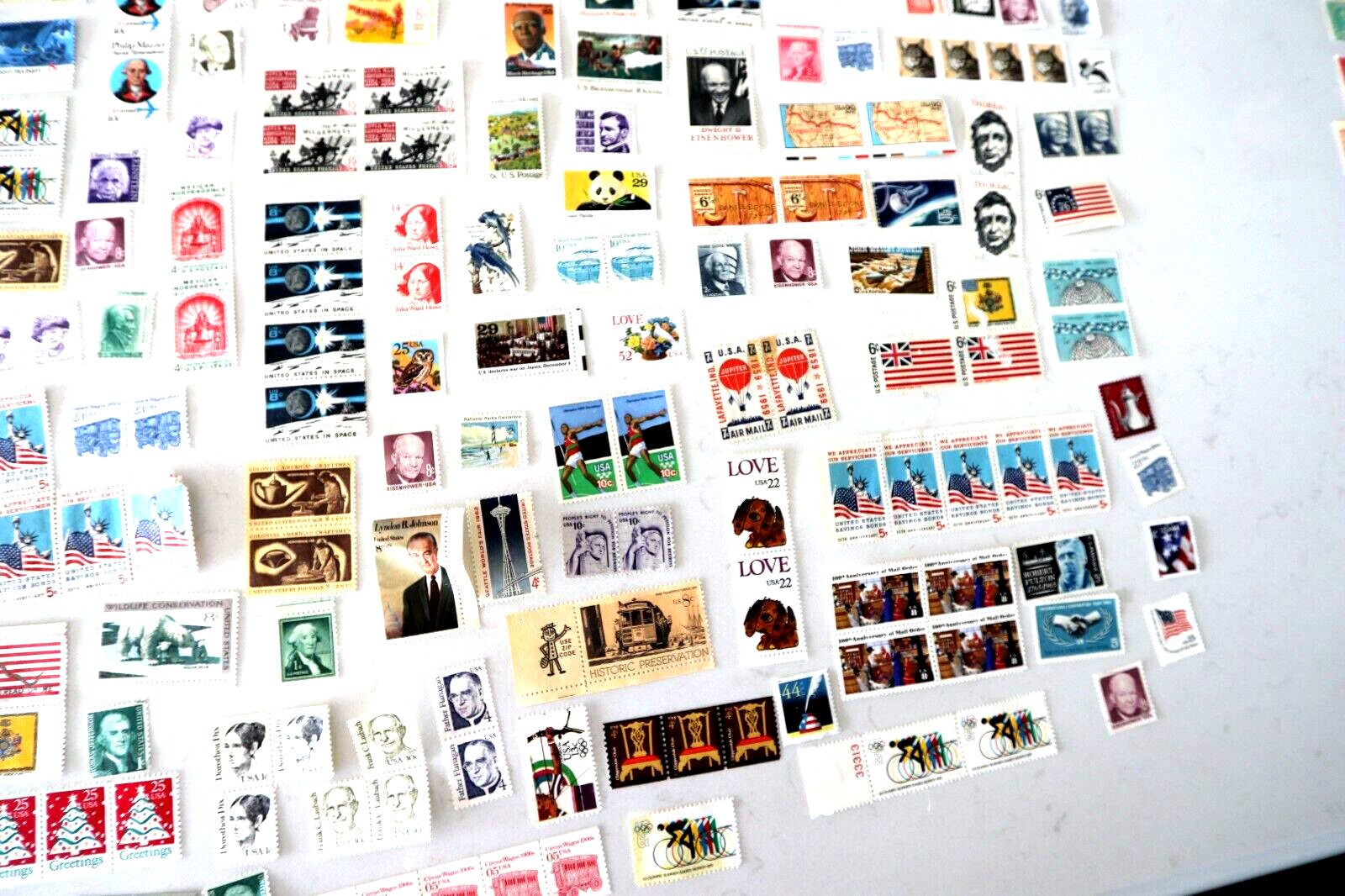 US Postage stamps various denominations mint no gum 1960’s thru 2010.