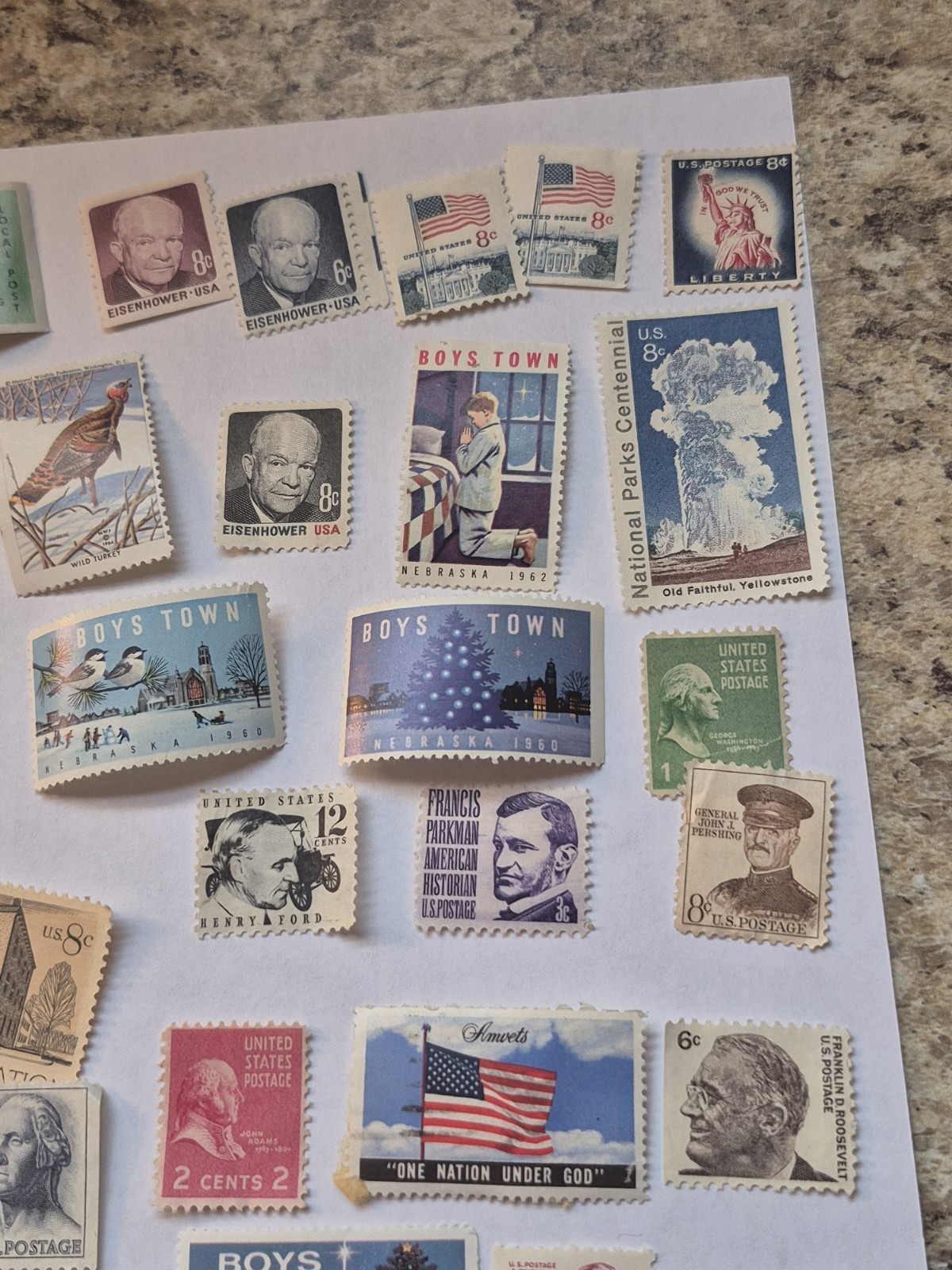 50 Mint condition US postage stamps. Various denominations 1940s,1950s,1960s