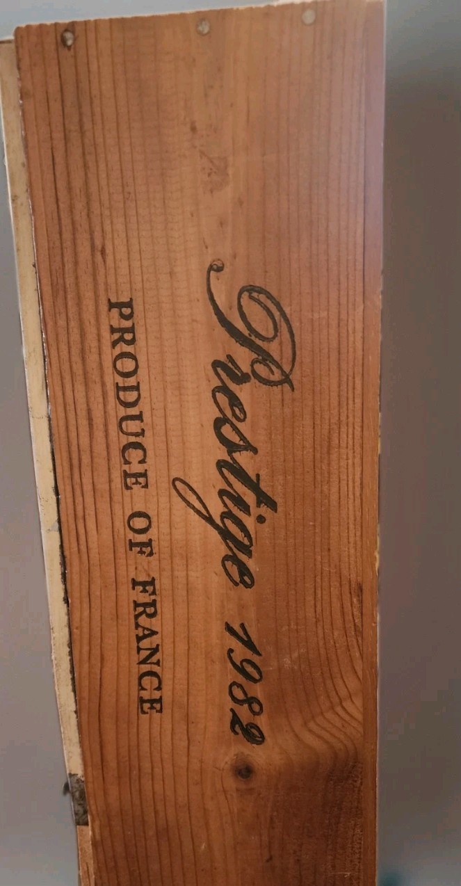 Vintage us postage stamps machine in vintage wood box