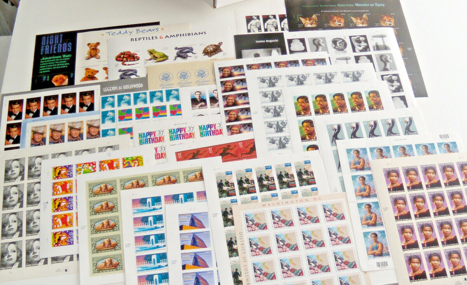 Four Sheets x 20 = 80 Assorted of Mixed Designs 37¢ US Postage Stamps. FV $29.60