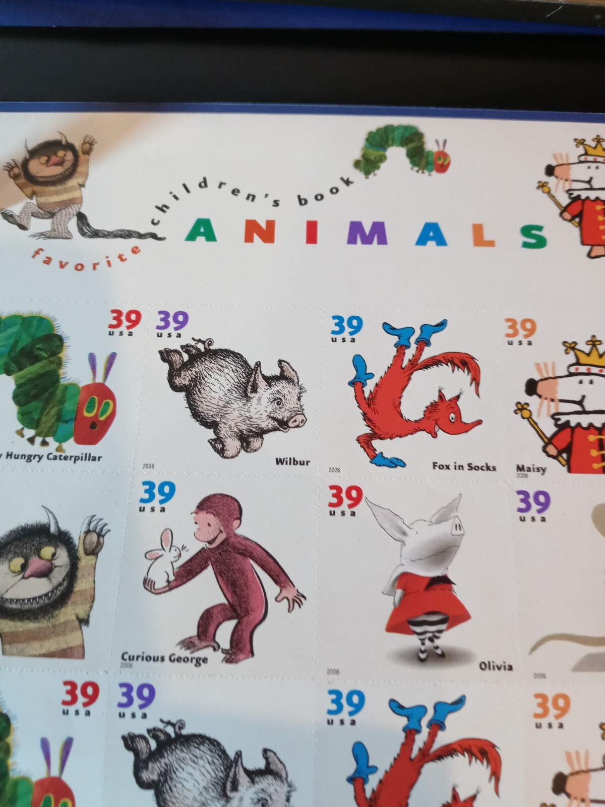 FAVORITE CHILDREN’S BOOK ANIMALS-SHEET OF (16) 39 CENT STAMPS IN FRAME