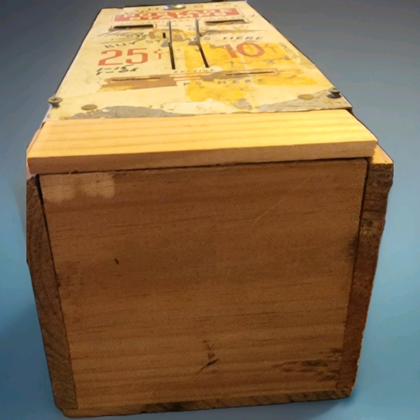 Vintage us postage stamps machine in vintage wood box