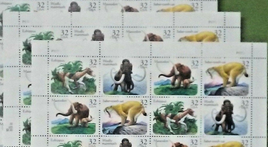 Four Sheets x 20 = 80 of PREHISTORIC ANIMALS 32¢ US Stamps. USA Sc # 3077-3080