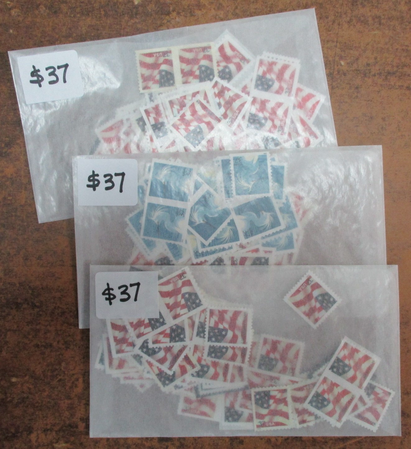 Discount Postage – 37¢ Values , 3 Packages of 100, Face $111 – Free Ship!