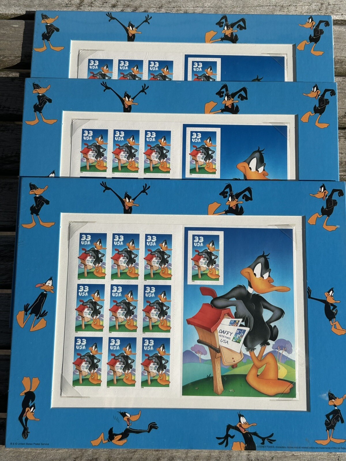Four Books (40) US Postage Stamps LOONEY TUNES Sylvester & Tweety & Daffy Matted