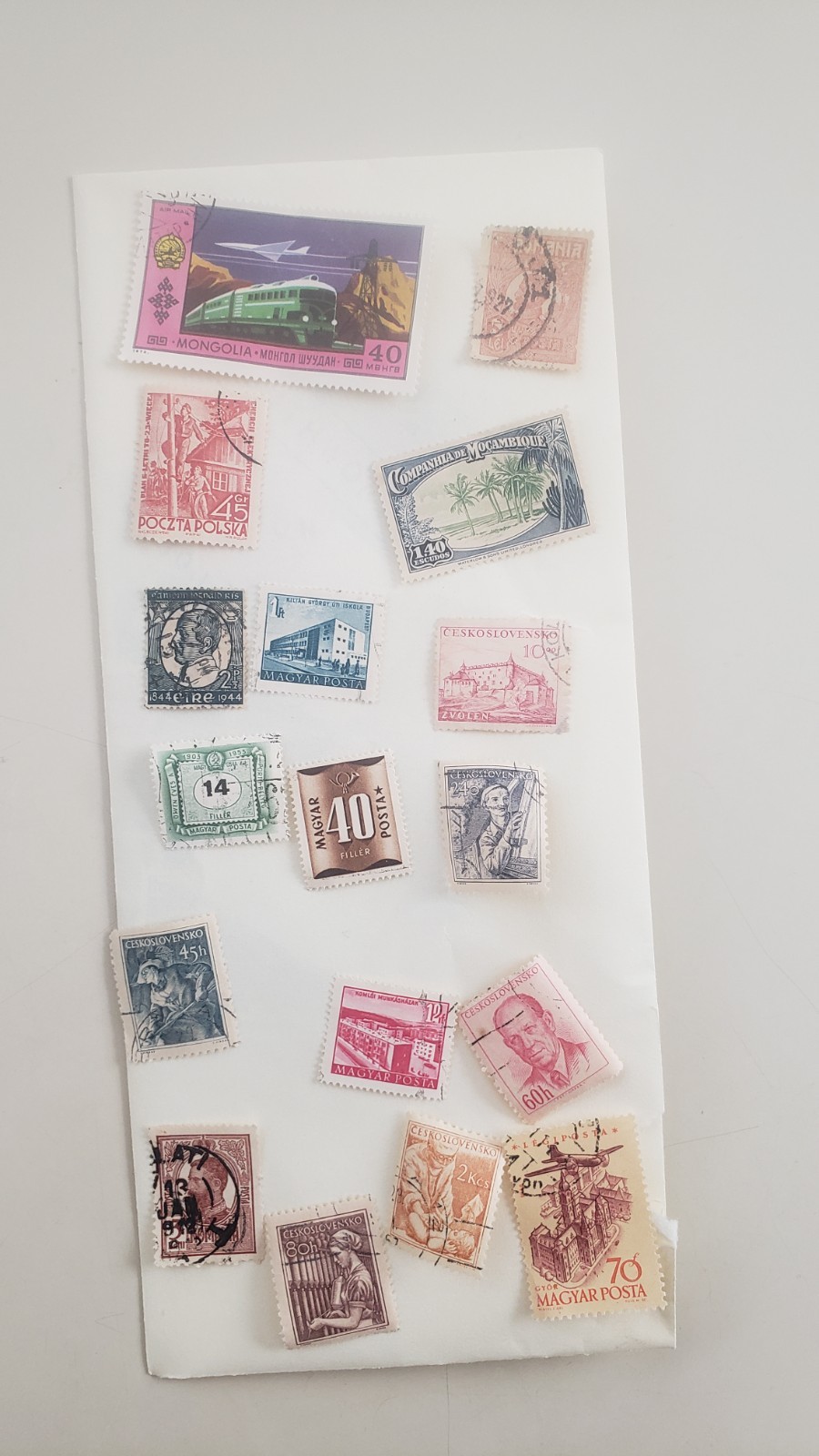 misclineous stamps from different regions of the world and 22kt gold replicas
