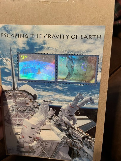 US Hologram Souvenir Sheet of 2. Escaping the Gravity of Earth.