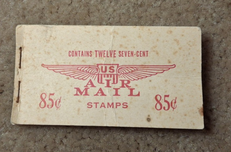US AIR MAIL STAMPS 85 CENT BOOKLET W/ 10/12 SEVEN-CENT STAMPS